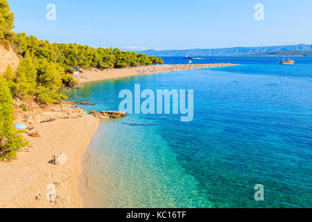 View of famous Zlatni Rat beach with beautiful sea water in Bol town, Brac island, Croatia Stock Photo