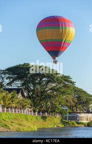 Hot air baloon in sky in Vang Vieng, Laos. Stock Photo