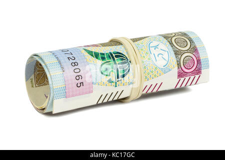 Polish banknotes of 500 PLN rolled with rubber isolated on white background with clipping path Stock Photo