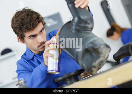 Measuring temperature of internal combustion Engine turbine by laser  infrared thermometer Stock Photo - Alamy