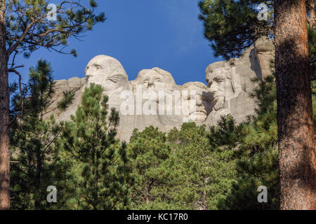 View of the presidents at Mount Rushmore as seen from the trail below.  Mount Rushmore National Monument, South Dakota, USA. Stock Photo