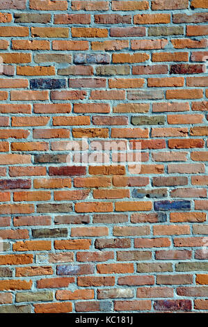 Old Weathered Brick Wall Background from the Colonial Era Stock Photo