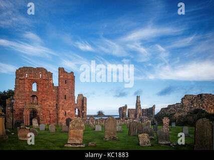 Ruins of the church built about 1150, on the site of 7th Century Lindisfarne Monastery on Holy Island,  Berwick-upon-Tweed, Northumberland, England Stock Photo