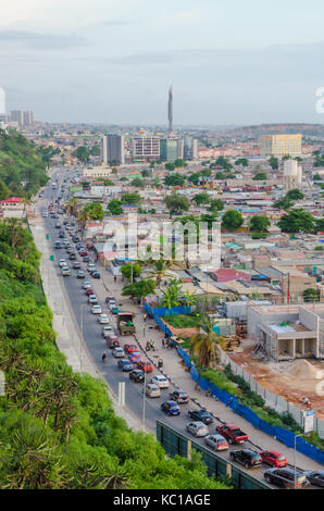 View over slums of Luanda with infamous traffic jams and Mausoleum of Agostinho Neto, Luanda, Angola, Africa Stock Photo