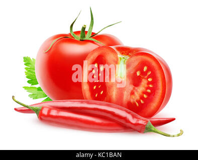 Isolated vegetables. Fresh cut tomatoes and chili peppers (hot sauce ingredients) isolated on white background with clipping path Stock Photo