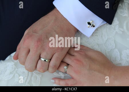 Newly weds holding hands in NOLA - English Couple Stock Photo