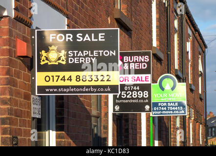 for sale signs on houses in a north of england, town. Stock Photo