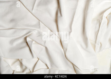 Horizontal version of textured white crumpled sheets Stock Photo