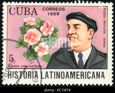 A postage stamp printed in CUBA  shows  a Oxalis adenophylla and Pablo Neruda, series 'Historia Latinoamericana', circa 1989 Stock Photo