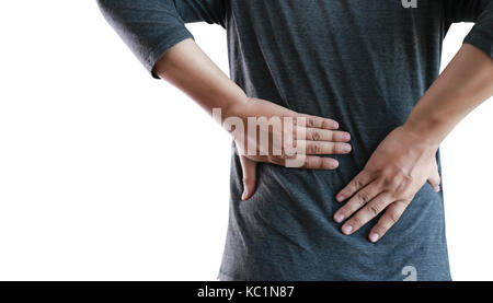 young man Feeling suffering  Lower back pain  Pain relief concept Stock Photo