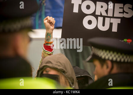 Manchester, UK. 1st october, 2017. Protestors march against Government cuts in anti austerity march held today in Manchester prior to the Conservative party conference. Manchester City Centre. Credit: GARY ROBERTS/Alamy Live News Stock Photo