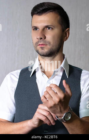 Photo portrait of a young businessman in a white shirt and waist Stock Photo