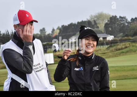 Auckland, New Zealand. 01st Oct, 2017. New Zealand's Lydia Ko shares a light moment with her coach Gary Gilchrist during the final day of the MCKAYSON New Zealand Women's Open at Windross Farm in Auckland, New Zealand on Oct 2, 2017. Canada's Brooke Henderson is crowned champion of the LPGA Tour event on New Zealand soil. Credit: Shirley Kwok/Pacific Press/Alamy Live News Stock Photo