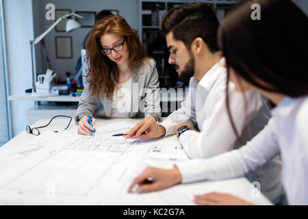 Group of architects working together on projecta Stock Photo