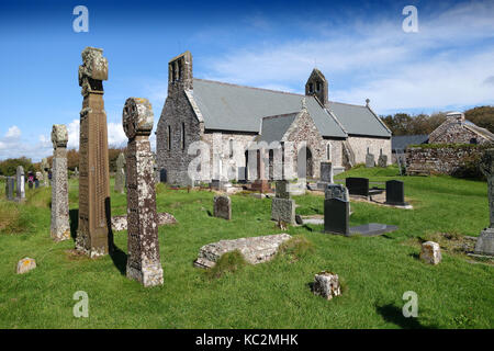 St Bridget's Church and churchyard with Celtic Crosses at St Brides Pembrokeshire Wales Cymru UK Stock Photo