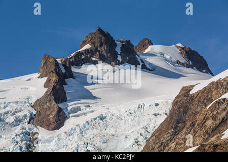 Blue Glacier and the West Peak of Mount Olympus in the dramatic setting at the end of the Hoh River Trail in Olympic National Park, Washington State,  Stock Photo