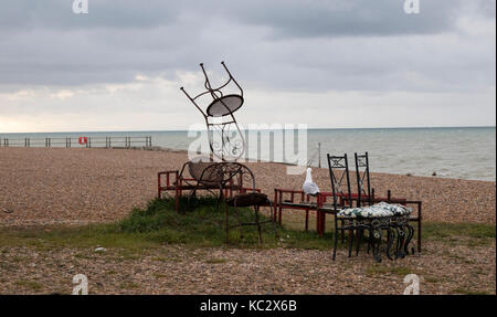 Chair sculpture on beach in Hastings, East Sussex, England Stock Photo