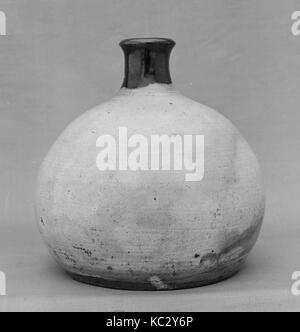 Oil Bottle, 19th century, Japan, Clay covered with white slip and a transparent glaze; darker glaze round the neck and lip Stock Photo