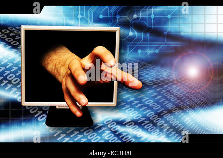 male hand coming out of a computer monitor, in a grabbing gesture, identity theft and internet crime concept Stock Photo