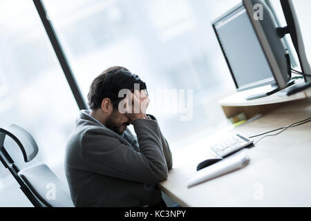 Portrait of frustrated businessman having problems in his work Stock Photo