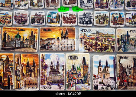 Prague, Czech republic - February 22, 2016: Souvenir magnets with pictures of Prague sights and landmarks for sale on a touristic street. Stock Photo
