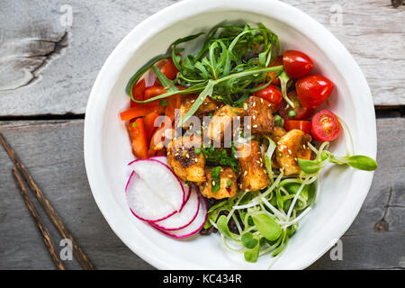 Glazed Tofu with Rocket ,Tomatoes,Sprouts and Radish over Riceberry Stock Photo