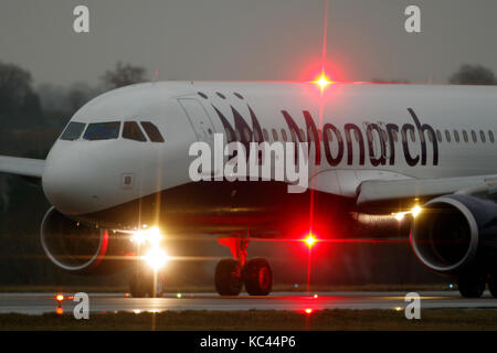 G-OZBZ Monarch Airlines Airbus A321-200 Monarch Airlines aircraft about to take off in bad weather at Luton airport Bedfordshire Stock Photo