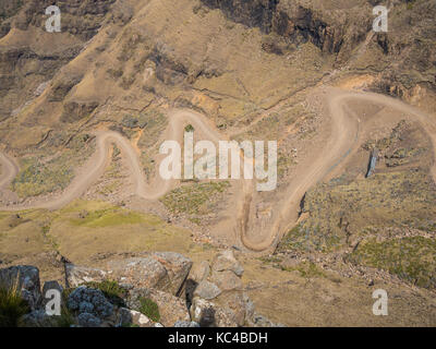 The famous Sani mountain pass dirt road with many tight curves connecting Lesotho and South Africa Stock Photo