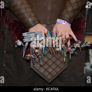 London, UK. 2nd Oct, 2017. The finalist of the Nailypia competition line up with their finished work, nails and fancy dress attracted huge crowds to see and take snaps on their phones to the truly work of art creations at this year Nailympia competition at the Beauty Olympia show.  Credit: Paul Quezada-Neiman/Alamy Live News Stock Photo