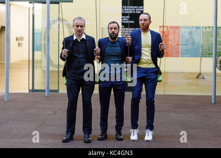 London, UK. 2nd Oct, 2017. JAKOB FENGER, RASMUS NIELSEN and BJORNSTJERNE CHRISTIANSEN of the Copenhagen artist group SUPERFLEX transform the Tate Modern Turbine Hall with their creation 'One Two Three Swing!' for the third Hyundai Commission. Based in Copenhagen SUPERFLEX was founded in 1993 by Danish artists and BjÃ¸rnstjerne Christiansen, Jakob Fenger and Rasmus Nielsen. They have gained international recognition for their projects and solo exhibitions around the world. Credit: ZUMA Press, Inc./Alamy Live News Stock Photo