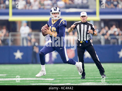 In this Sunday, Oct. 8, 2017, file photo, Los Angeles Rams quarterback  Jared Goff (16) hands the ball to Todd Gurley (30) during an NFL football  game against the Seattle Seahawks, in