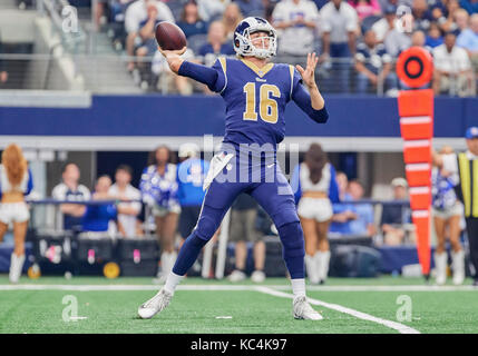 In this Sunday, Oct. 8, 2017, file photo, Los Angeles Rams quarterback  Jared Goff (16) hands the ball to Todd Gurley (30) during an NFL football  game against the Seattle Seahawks, in