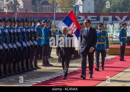 (171002) -- BELGRADE, Oct. 2, 2017 (Xinhua) -- Visiting Greek President Prokopis Pavlopoulos (L, front) and his Serbian counterpart Aleksandar Vucic (R, front) review the honor guards in Belgrade, Serbia, Oct. 2, 2017. Greece will support Serbia as well as all other Balkan countries who wish to become part of the European Union (EU), but these countries must respect international right, as well as European principles and heritage, said Greek President Prokopis Pavlopoulos during his visit to Serbia on Monday. (Xinhua/Nemanja Cabric) Stock Photo