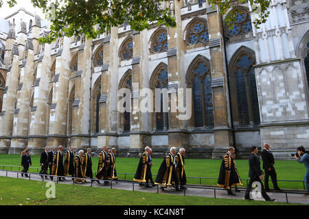London, UK. 02nd Oct, 2017. Supreme Court Judges looking resplendent in their black robes, as they process to Westminster Abbey. A service in Westminster Abbey is conducted by the Dean of Westminster to mark the start of the legal year. Judges, law officers, Queen's Counsel (QC), government ministers and lawyers attend the service, with Judges and QC's wearing ceremonial dress. Judges process on The Start of the Legal Year in Westminster, London, on October 2nd, 2017. Credit: Paul Marriott/Alamy Live News Stock Photo