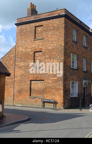 Three storey building on Lower Fisher Row, Oxford showing bricked up windows perhaps as a result of Window Tax Stock Photo