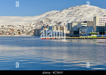 Snow-white bay with residential buildings, Hammerfest, Finnmark, Norway Stock Photo