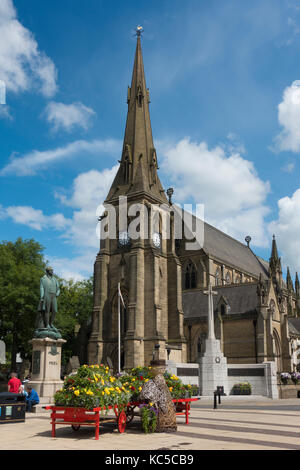 Peel Memorial Statue and St Marys Church in Bury Town Centre. Stock Photo
