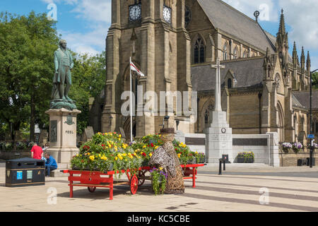 Peel Memorial Statue and St Marys Church in Bury Town Centre. Stock Photo