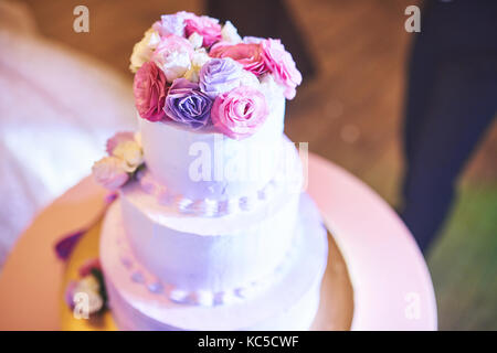 Beautiful of Wedding Cake with Flowers on Top Stock Photo