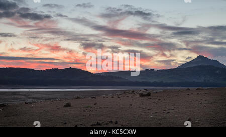 Sunset silhouette in the central side of Sicily; Pozzillo lake in winter. Stock Photo
