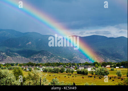 Rainbow over the small mountain town of Salida, Colorado, USA Stock Photo