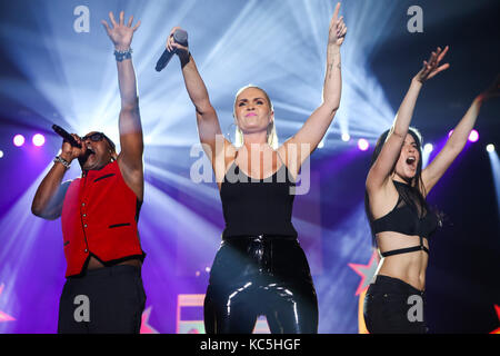 Haddaway (civil name Alexander Nestor Haddaway), Trinidadian-German singer performs his 90s Eurodance hit 'What is love' (here with femal co-singer and dancer) at 90er Party Arena Wetzlar (party with mainly Eurodance-stars from the 90s), Rittal-Arena, Wetzlar, Germany, 30th September, 2017. Credit: Christian Lademann Stock Photo
