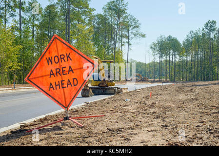 'Work Area Ahead' temporary sign warning of construction work at a new residential subdivision in Pike Road, Alabama, USA. Stock Photo