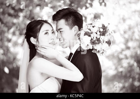 close-up portrait of loving wedding couple, black and white. Stock Photo