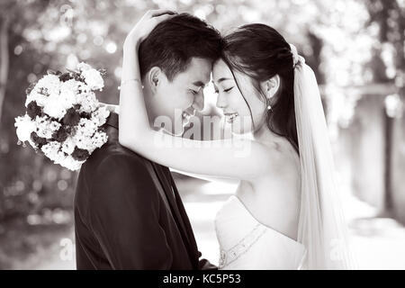 close-up portrait of intimate wedding couple, black and white. Stock Photo