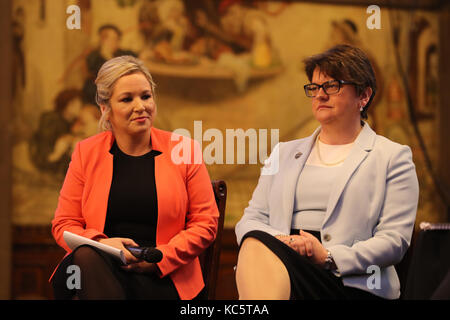 DUP leader Arlene Foster and Sinn Fein's Northern Ireland leader Michelle O'Neill attend the Ulster fry breakfast at Manchester Town Hall during the Conservative Party Conference at the Manchester Central Convention Complex in Manchester. Stock Photo