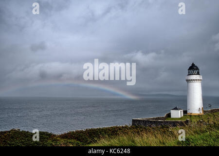 Davaar Lighthouse with stormy sky and rainbow Stock Photo