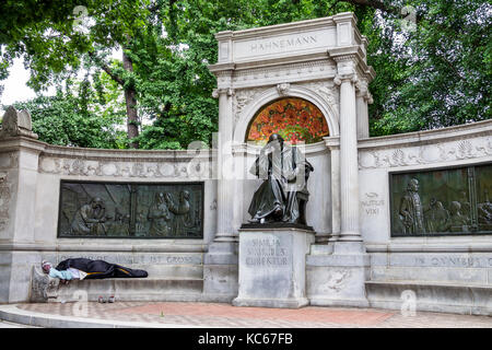 Washington DC,Massachusetts Avenue,Scott Circle,Samuel Hahnemann Monument,homeopathy,homeless,sleeping,DC170527098 Stock Photo
