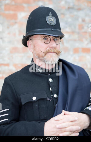 Gentleman dressed in 1940's vintage Police uniform Stock Photo