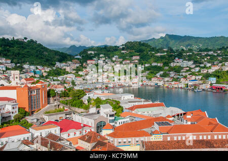 Overview above St. George's Harbor surrouned by colorful buildings, Grenada Stock Photo